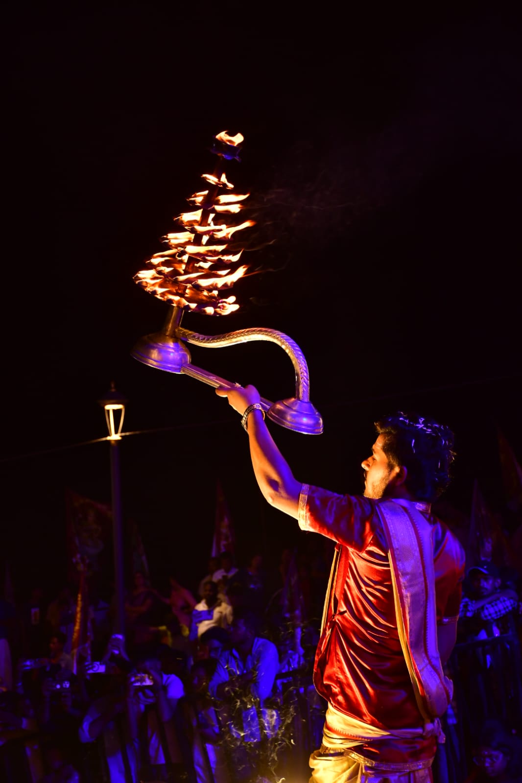 Priests with ritual lamps